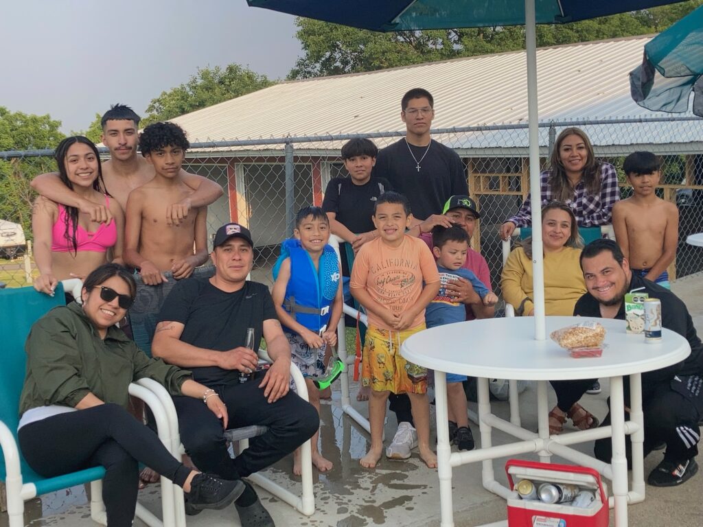 family on pool deck